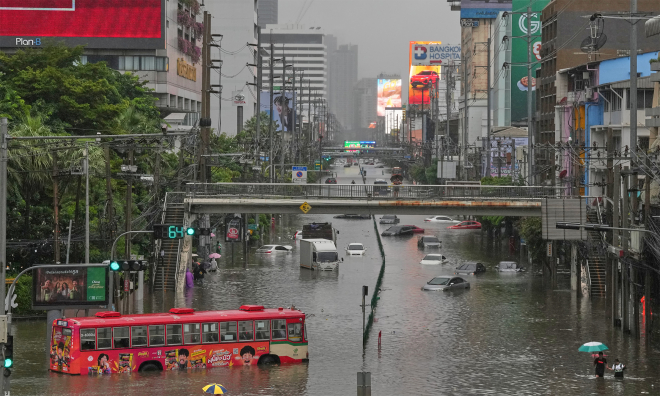 Series of cars submerged in a sea of water in Bangkok