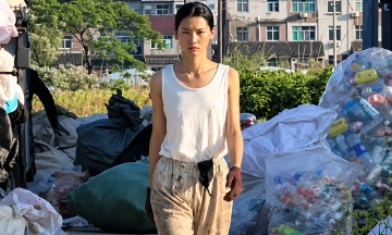 1.81 m tall girl balances trash collection and modeling career