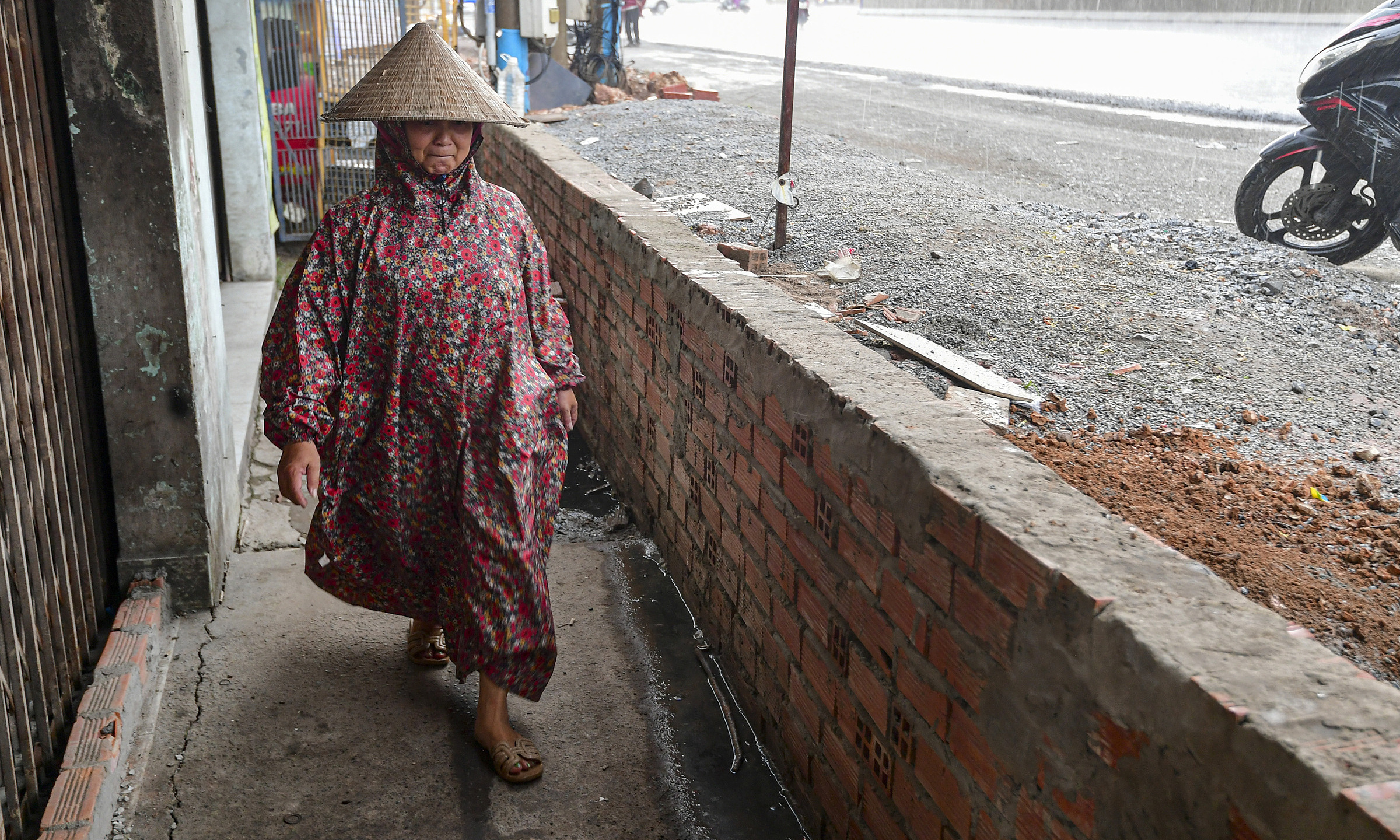 Houses a meter lower than road level as National Highway 13 elevated