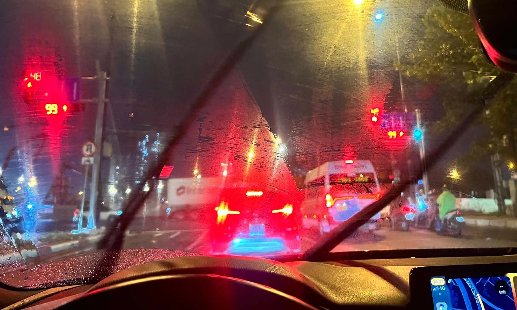 Why do windshield wipers blur the view in the rain?