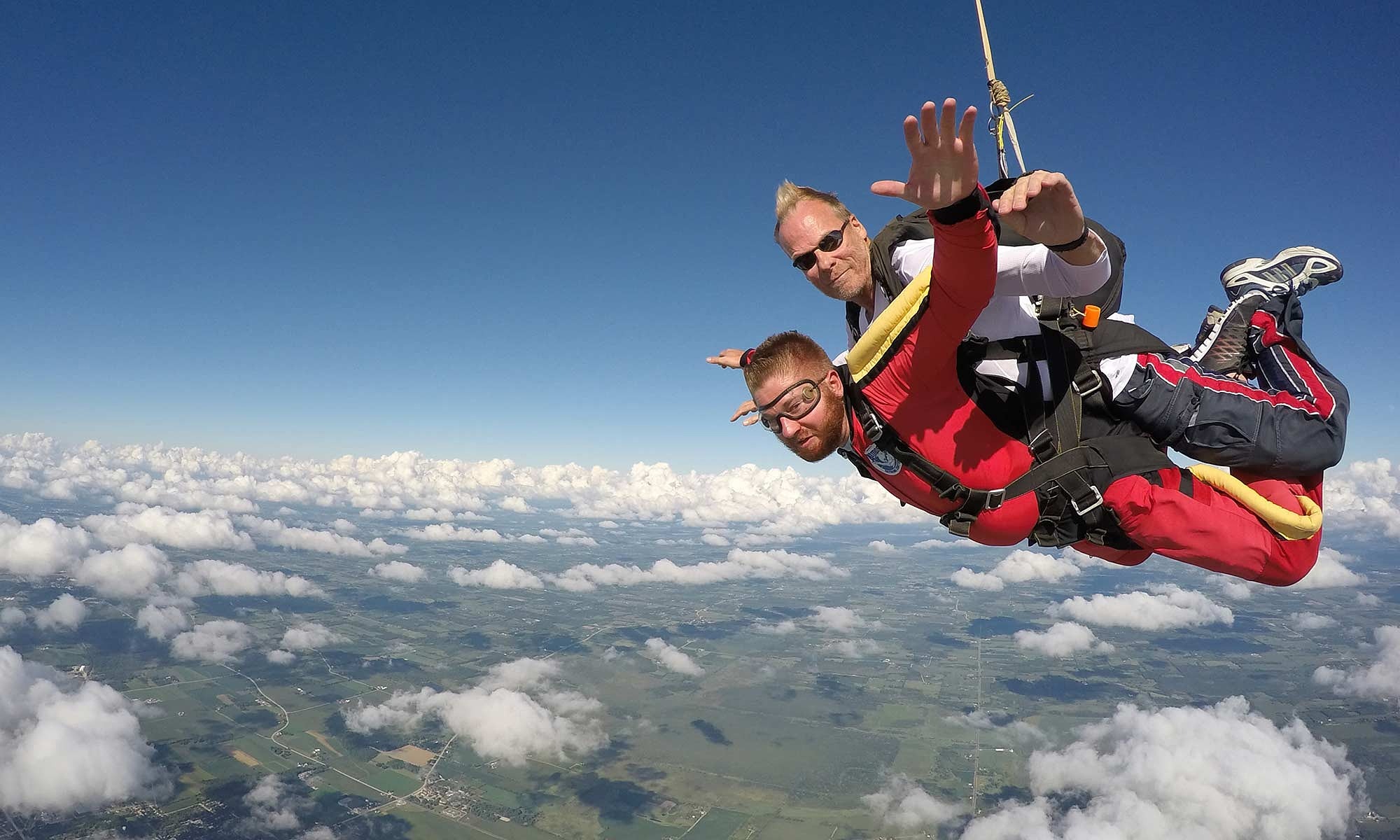Skydivers parachute from 900 meters to rescue plane crash victims