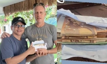 French tourist sparks debate with $3 tip after $3,000 envelope returned